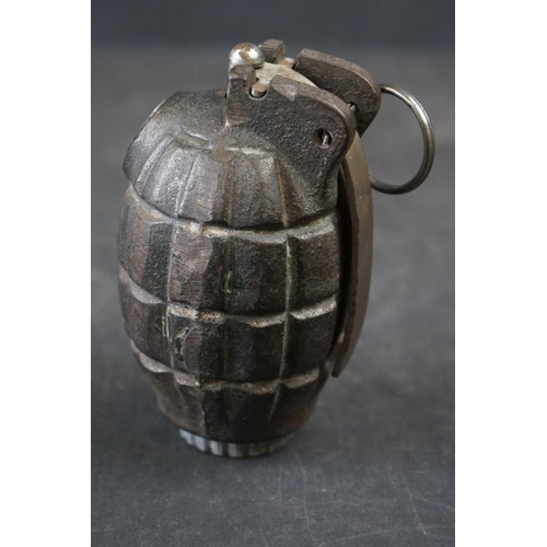 140A - A British World War One Inert Mills Grenade No.36M Mk.1 Complete With Clip And Pin.