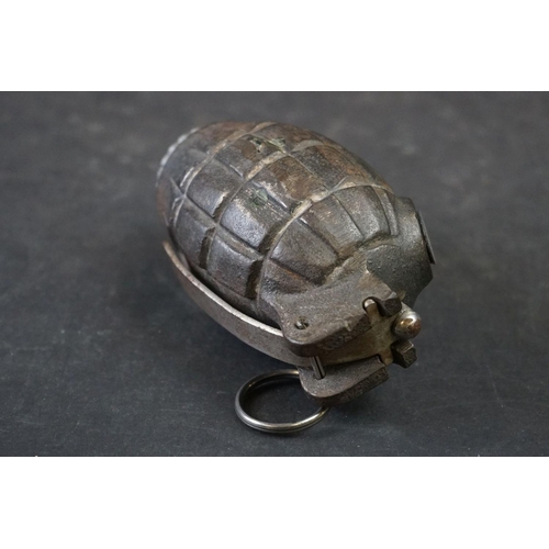 140A - A British World War One Inert Mills Grenade No.36M Mk.1 Complete With Clip And Pin.