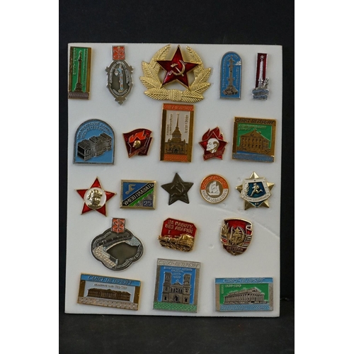 423 - A Small Collection Of Russian Military And Commemorative Badges.