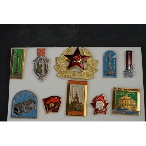 423 - A Small Collection Of Russian Military And Commemorative Badges.