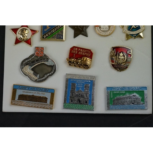 423 - A Small Collection Of Russian Military And Commemorative Badges.