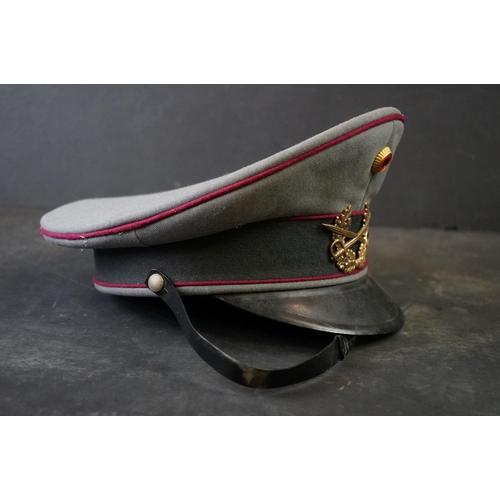 425 - A East German Military Officers Cap With Crossed Swords And laurel Cap Badge.