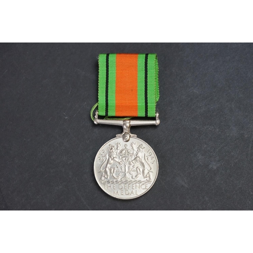 429 - A British Full Size World War Two 1939-1945 Defence Medal With Correct And Original Ribbon.