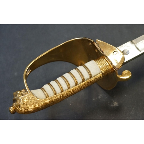 99 - A British Royal Navy Dress Sword With Queen Elizabeth II Cypher, Complete With Original Scabbard.