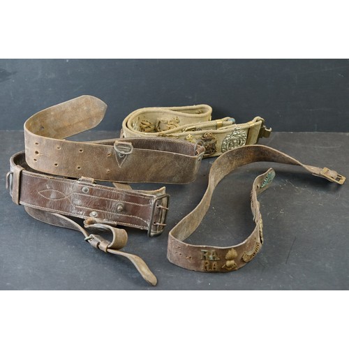 431 - Two British Military Belts To Include A Brown Leather Sam Browne Examples Both Decorated With Britis... 