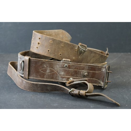 431 - Two British Military Belts To Include A Brown Leather Sam Browne Examples Both Decorated With Britis... 