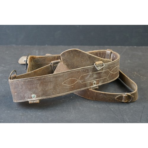 431 - Two British Military Belts To Include A Brown Leather Sam Browne Examples Both Decorated With Britis... 