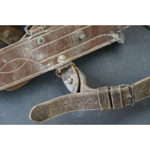 431 - Two British Military Belts To Include A Brown Leather Sam Browne Examples Both Decorated With Britis... 