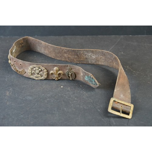 431 - Two British Military Belts To Include A Brown Leather Sam Browne Examples Both Decorated With Britis... 