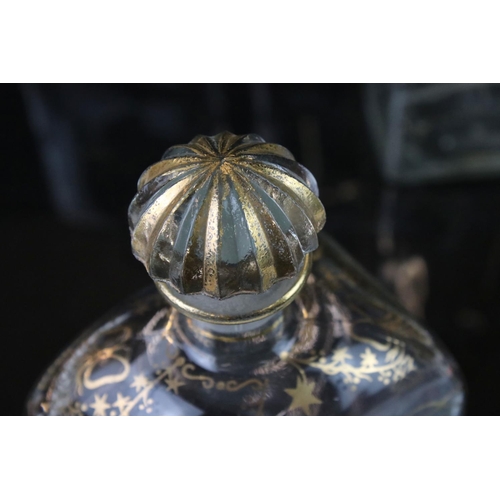 25 - Five Spanish Glass Liquor Decanters and stoppers with gilt decorations marked to base Jerez, Spain, ... 
