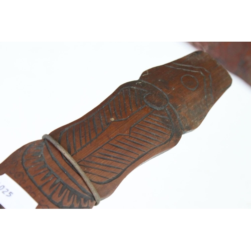 109 - A collection of three oriental bamboo page turners with ornate carved decoration.