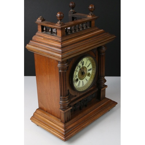 111 - An antique wooden cased chiming bracket clock.