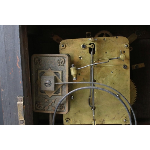 111 - An antique wooden cased chiming bracket clock.
