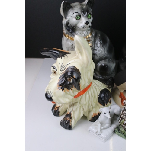86 - Collection of Ceramic Animals including Pair of Scottish Foreside Cats with glass eyes, 31cms high, ... 
