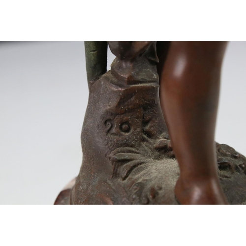 89 - An early 20th century cast lamp in the form of a flower and cherub.