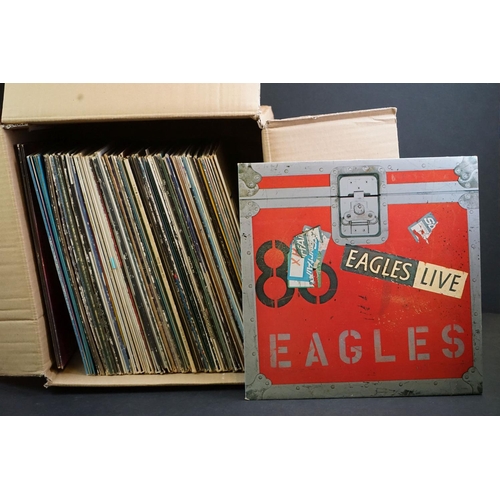 192 - Vinyl - Over 70 Rock & Pop LP's including The Eagles, The Who, U2, Carly Simon, Brian Eno, Boomtown ... 