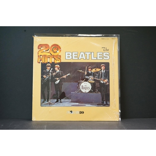 39 - Vinyl - The Beatles 2 picture discs, 9 LP's and one book.  Picture discs are Abbey Road (SEAX 11900)... 