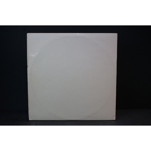 47 - Vinyl - The Beatles White Album, Stereo unnumbered side opener sleeve.  4 photographs and poster pre... 