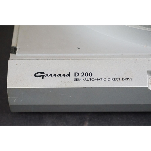 25 - Three Garrard turntables / record decks, to include D 200 Semi-Automatic Direct Drive, DD 455 Fully ... 