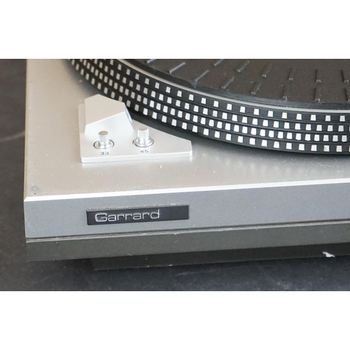 25 - Three Garrard turntables / record decks, to include D 200 Semi-Automatic Direct Drive, DD 455 Fully ... 