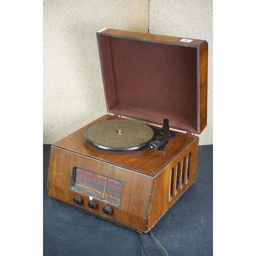 8 - Three vintage Garrard record players, to include Garrard 4SP & two others, one with built in radio, ... 