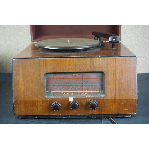 8 - Three vintage Garrard record players, to include Garrard 4SP & two others, one with built in radio, ... 