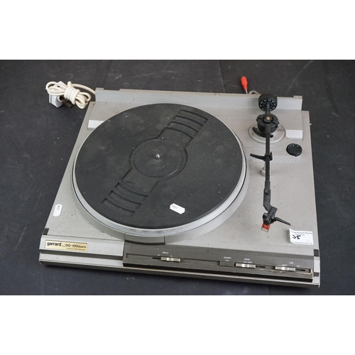 35 - Three Garrard turntables / record decks, to include AT 60 with plastic dust cover, GT-35P & DQ-100 Q... 