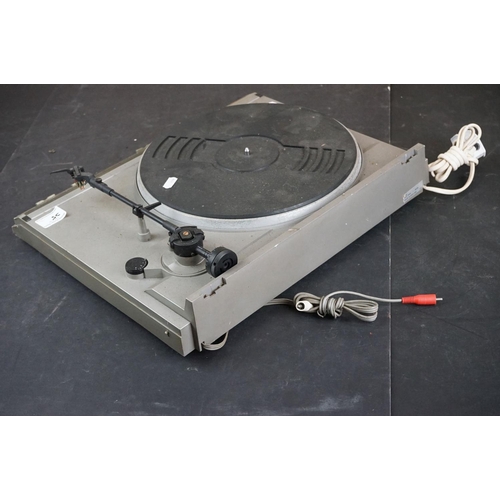 35 - Three Garrard turntables / record decks, to include AT 60 with plastic dust cover, GT-35P & DQ-100 Q... 