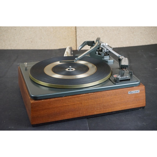 35 - Three Garrard turntables / record decks, to include AT 60 with plastic dust cover, GT-35P & DQ-100 Q... 