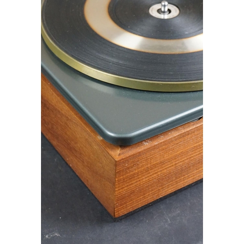 35 - Three Garrard turntables / record decks, to include AT 60 with plastic dust cover, GT-35P & DQ-100 Q... 