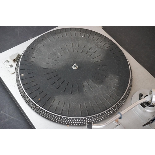 35 - Three Garrard turntables / record decks, to include AT 60 with plastic dust cover, GT-35P & DQ-100 Q... 