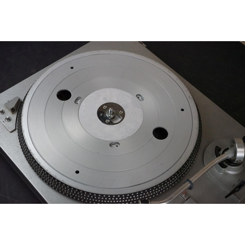 35 - Three Garrard turntables / record decks, to include AT 60 with plastic dust cover, GT-35P & DQ-100 Q... 