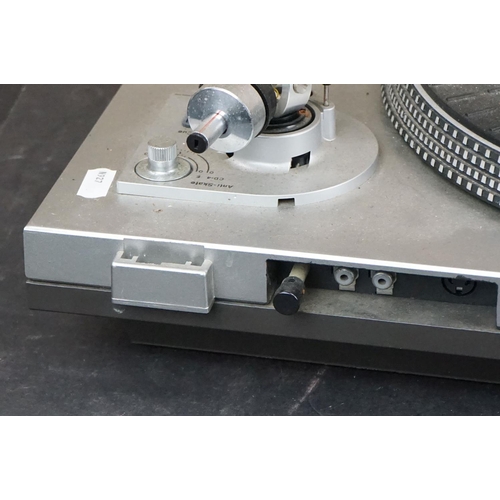 35 - Three Garrard turntables / record decks, to include AT 60 with plastic dust cover, GT-35P & DQ-100 Q... 