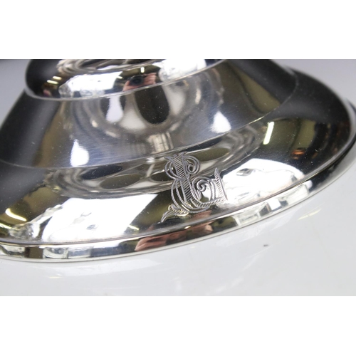 106 - An antique silver plated cruet / condiment centre piece with decorative etched glass bottles.