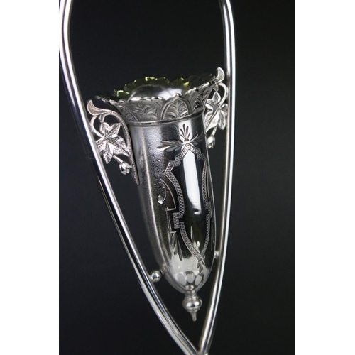 106 - An antique silver plated cruet / condiment centre piece with decorative etched glass bottles.