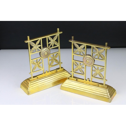 107 - Vintage weighted brass bookends decorated with sunflower and leaves