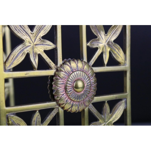 107 - Vintage weighted brass bookends decorated with sunflower and leaves