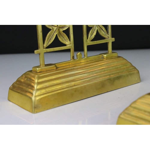 107 - Vintage weighted brass bookends decorated with sunflower and leaves