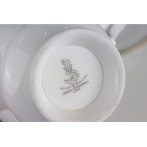 76 - Royal Doulton ' Gold Concord ' Dinner and Tea ware comprising 6 Dinner Plates, Serving Plate, 2 Lidd... 