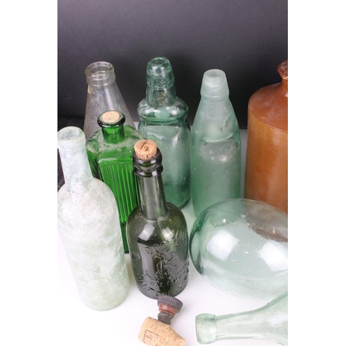 81 - Thirteen 19th and Early 20th century Glass Bottles including Poison and Lemonade plus a Stoneware Bo... 