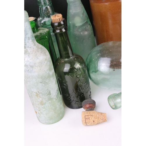81 - Thirteen 19th and Early 20th century Glass Bottles including Poison and Lemonade plus a Stoneware Bo... 