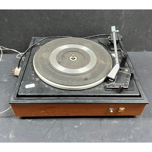 44 - A Garrard 86sb turntable mounted with a Dynatron 1275B amplifier, a Derens turntable radio, A Garrar... 