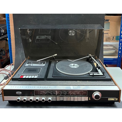 44 - A Garrard 86sb turntable mounted with a Dynatron 1275B amplifier, a Derens turntable radio, A Garrar... 