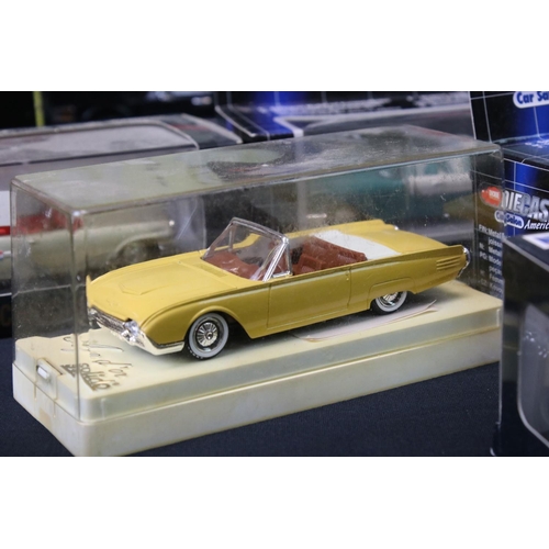 35 - 24 Boxed / cased diecast models featuring mainly American convertibles to include 1/18 Road Signatur... 