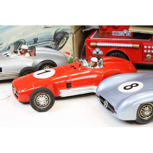 277 - Three Western Germany JNF tin plate model cars (two friction), one with box, plus a boxed SH Japan t... 