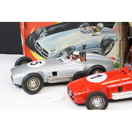 277 - Three Western Germany JNF tin plate model cars (two friction), one with box, plus a boxed SH Japan t... 