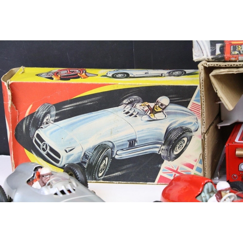 277 - Three Western Germany JNF tin plate model cars (two friction), one with box, plus a boxed SH Japan t... 