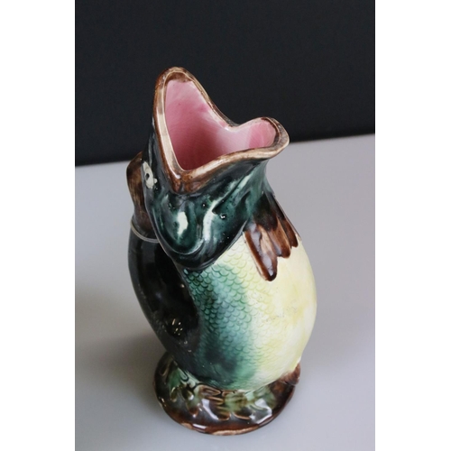 11 - Two Gurgle Jugs, one Royal Winton 22cm high and the other Majolica 22cm high