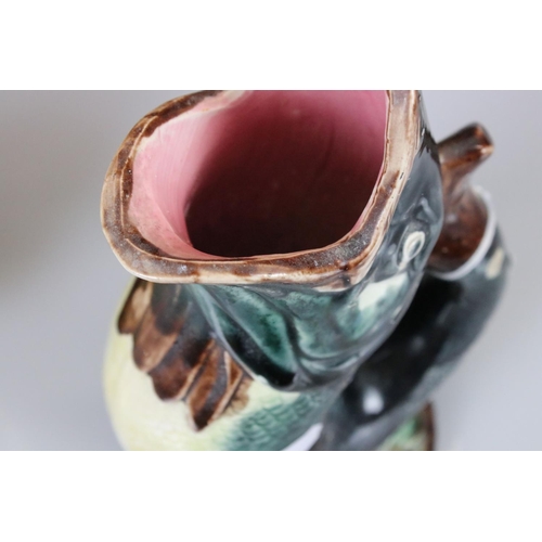 11 - Two Gurgle Jugs, one Royal Winton 22cm high and the other Majolica 22cm high