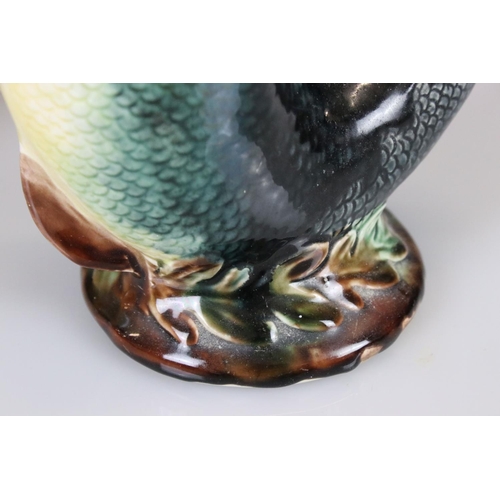 11 - Two Gurgle Jugs, one Royal Winton 22cm high and the other Majolica 22cm high
